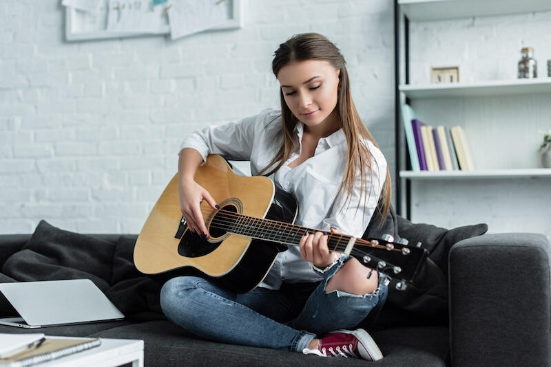 Girls playing guitar